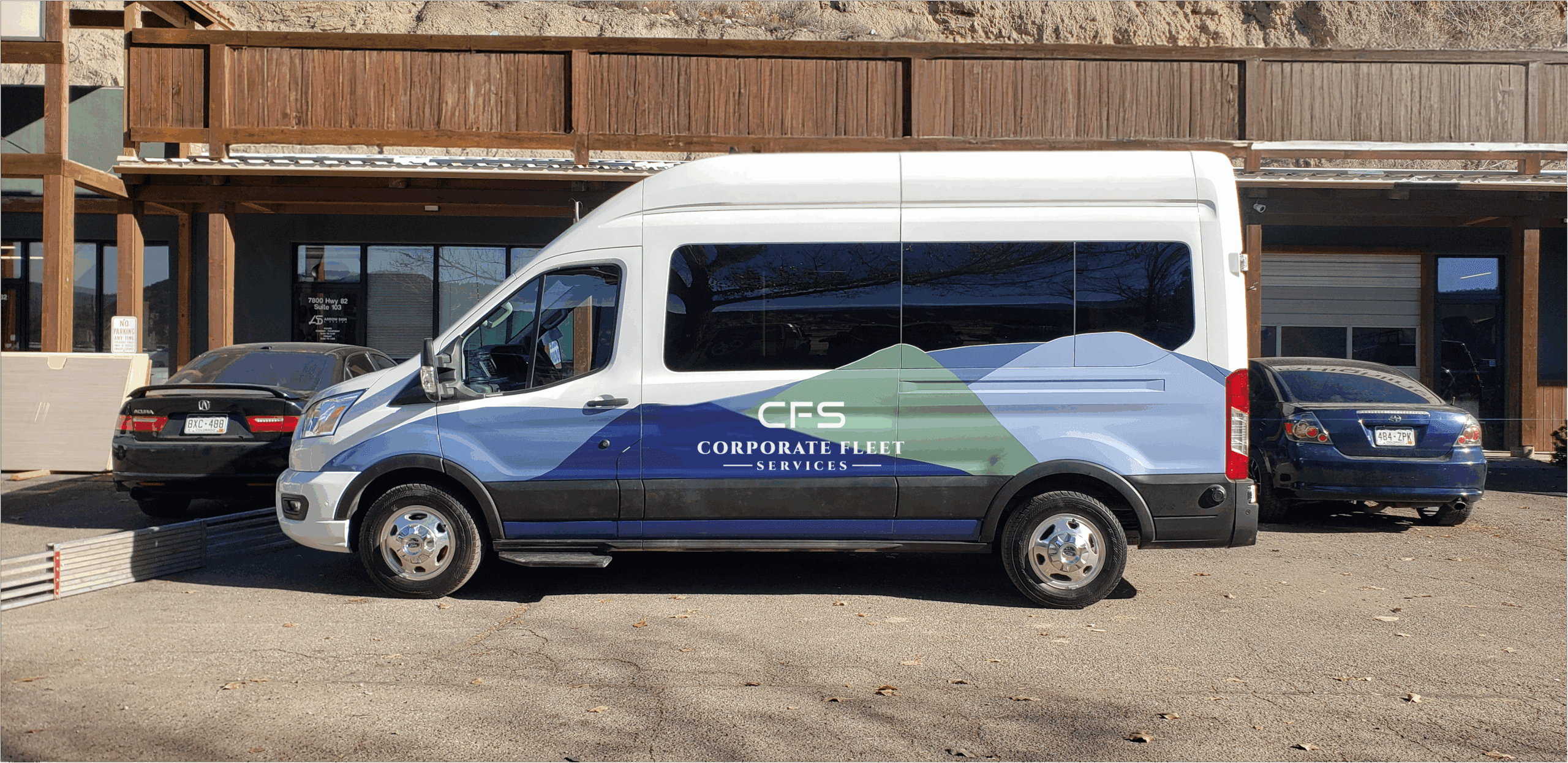 Upfitted CFS van with logo graphics wrap